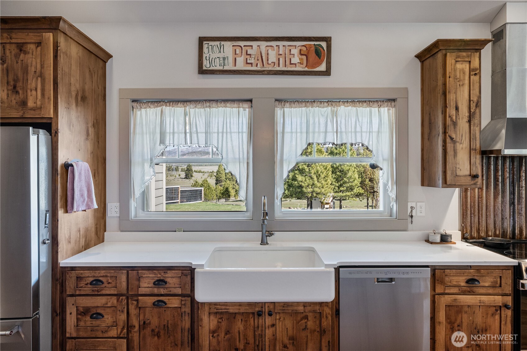 710 Hidden Valley Road Cle Elum, WA 98922 - Photo 14 of 35 a view of a kitchen with a window and a sink