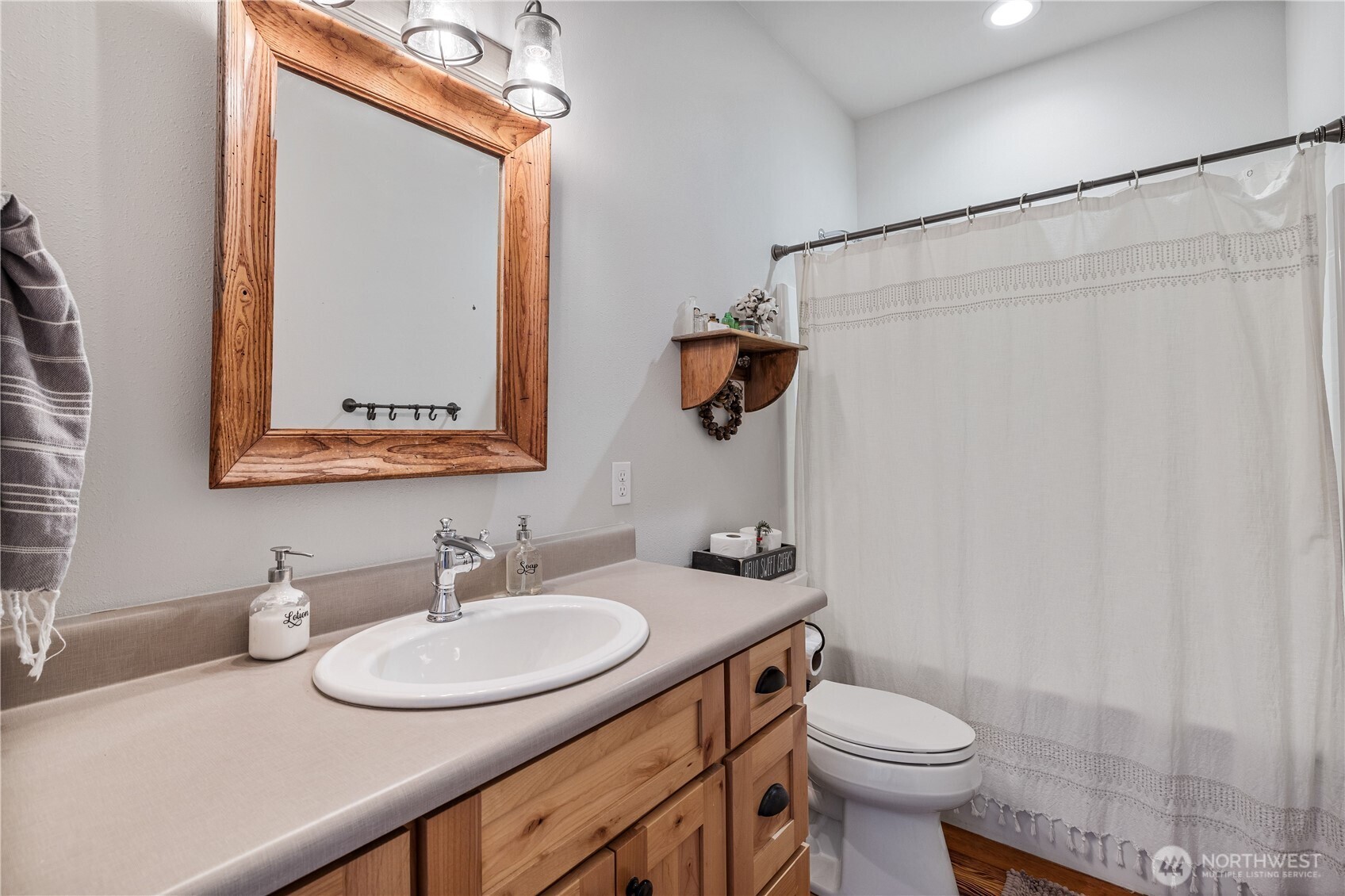 710 Hidden Valley Road Cle Elum, WA 98922 - Photo 17 of 35 a bathroom with a sink toilet and shower