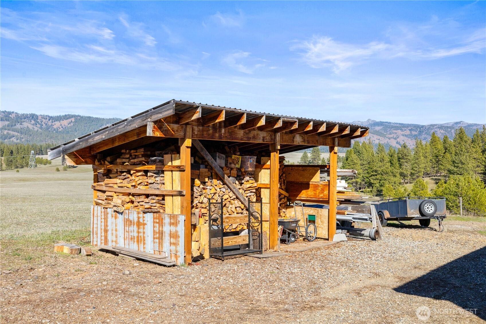 710 Hidden Valley Road Cle Elum, WA 98922 - Photo 28 of 35 a view of a house with backyard porch and furniture