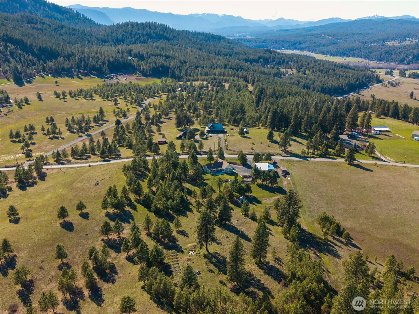 710 Hidden Valley Road Cle Elum, WA 98922 - Photo 33 of 35 a view of a town with mountains in the background