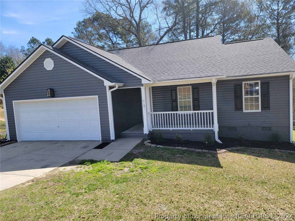 191 Rye Lane Raeford, NC 28376 - Photo 4 of 44 front view of a house with a yard