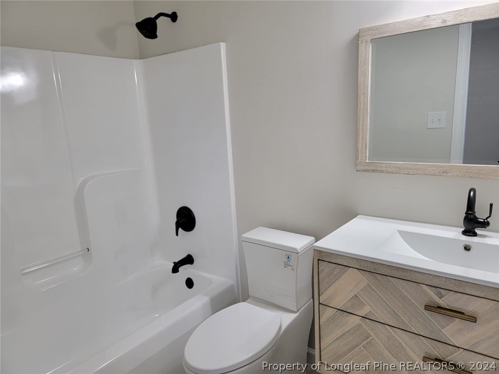 191 Rye Lane Raeford, NC 28376 - Photo 44 of 44 a bathroom with a sink a toilet and shower