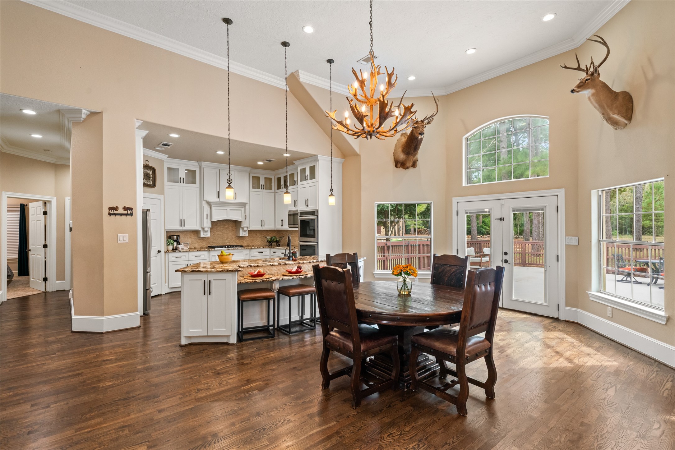 32660 Willow Bend Road Waller, TX 77484 - Photo 6 of 47 Bright dining area flows seamlessly into the kitchen and living spaces, creating an ideal layout for everyday living and entertaining.
