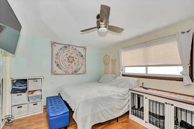 a bedroom with furniture and window