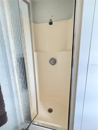 a view of a livingroom with furniture and window