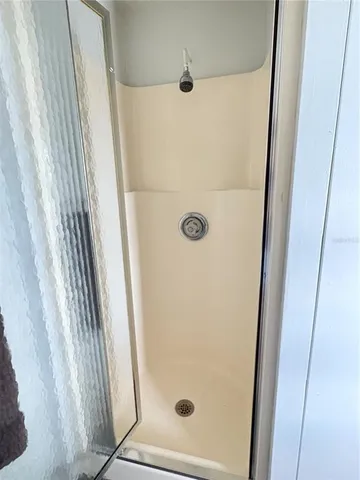 a view of a livingroom with furniture and window