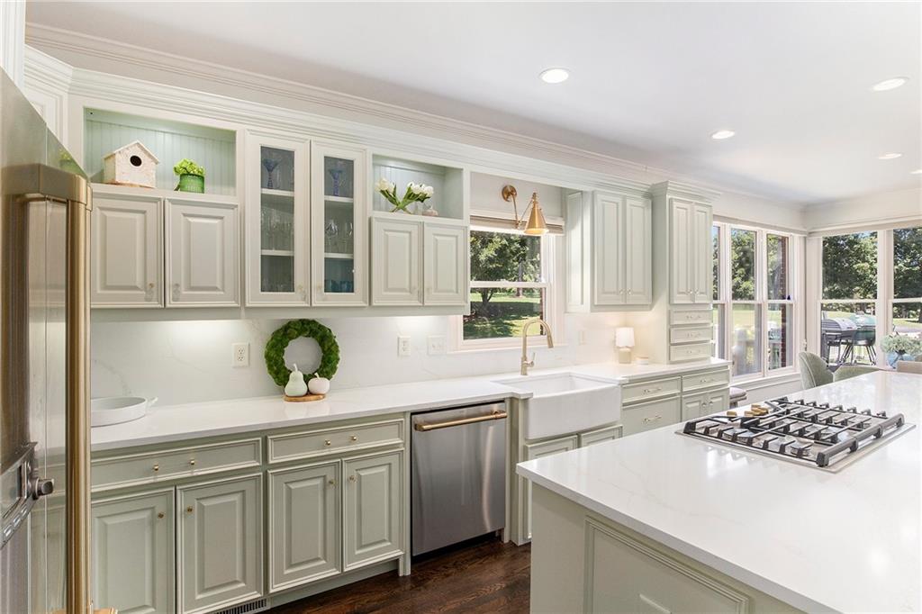 960 Providence Lane Monroe, GA 30656 - Photo 12 of 53 a kitchen with a sink and cabinets