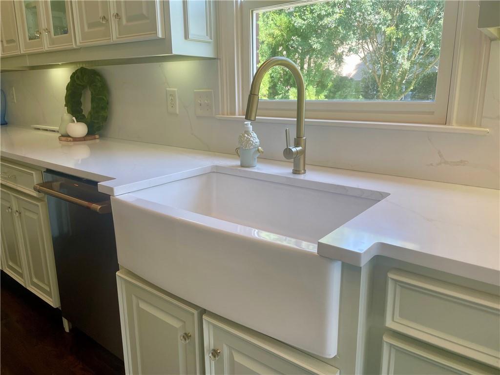 960 Providence Lane Monroe, GA 30656 - Photo 13 of 53 a kitchen with a sink and a window