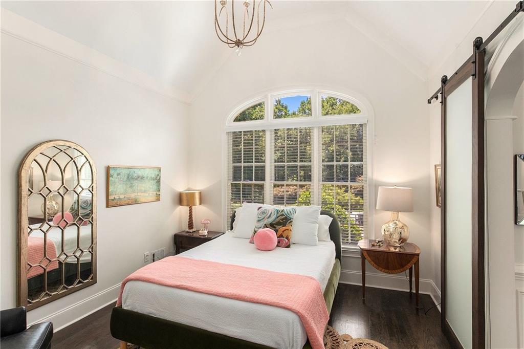 960 Providence Lane Monroe, GA 30656 - Photo 29 of 53 a bedroom with a bed and a window