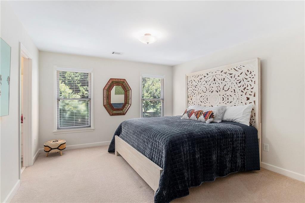 960 Providence Lane Monroe, GA 30656 - Photo 34 of 53 a bedroom with a bed and a window