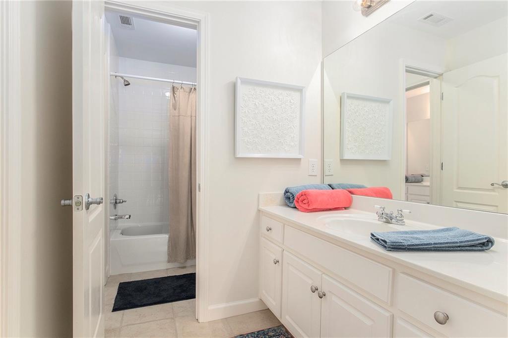 960 Providence Lane Monroe, GA 30656 - Photo 37 of 53 a bathroom with a sink and a mirror