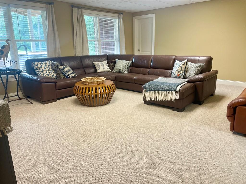 960 Providence Lane Monroe, GA 30656 - Photo 39 of 53 a living room with furniture and a large window