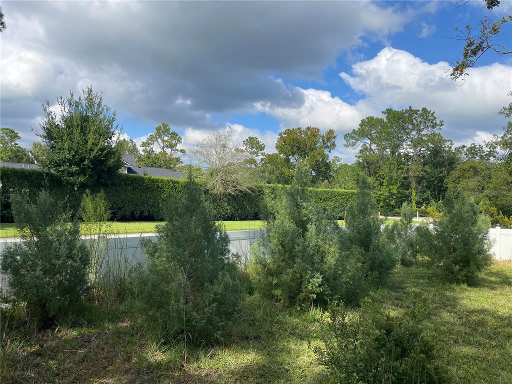213 Riverbend Road Ormond Beach, FL 32174 - Photo 76 of 78 a view of a lake