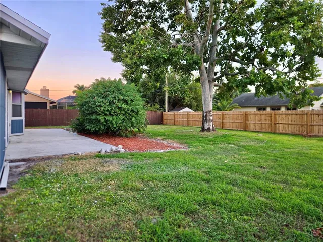 a view of a backyard with a garden