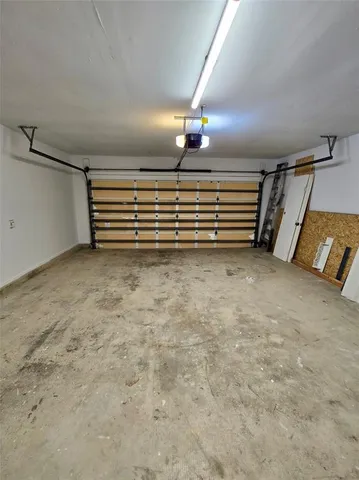 a view of an empty room with stairs