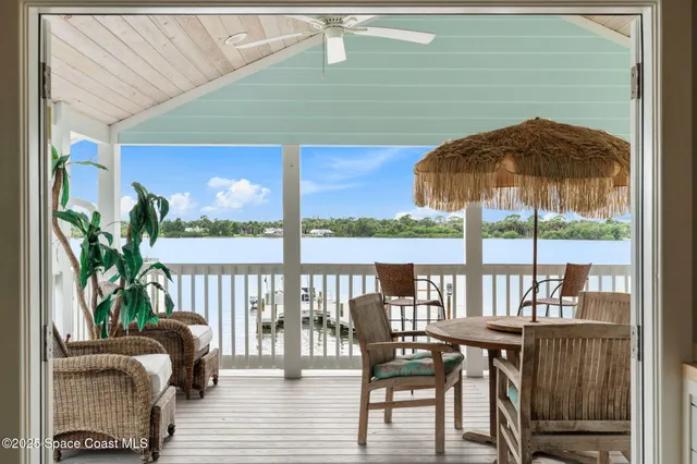 a view of balcony with furniture