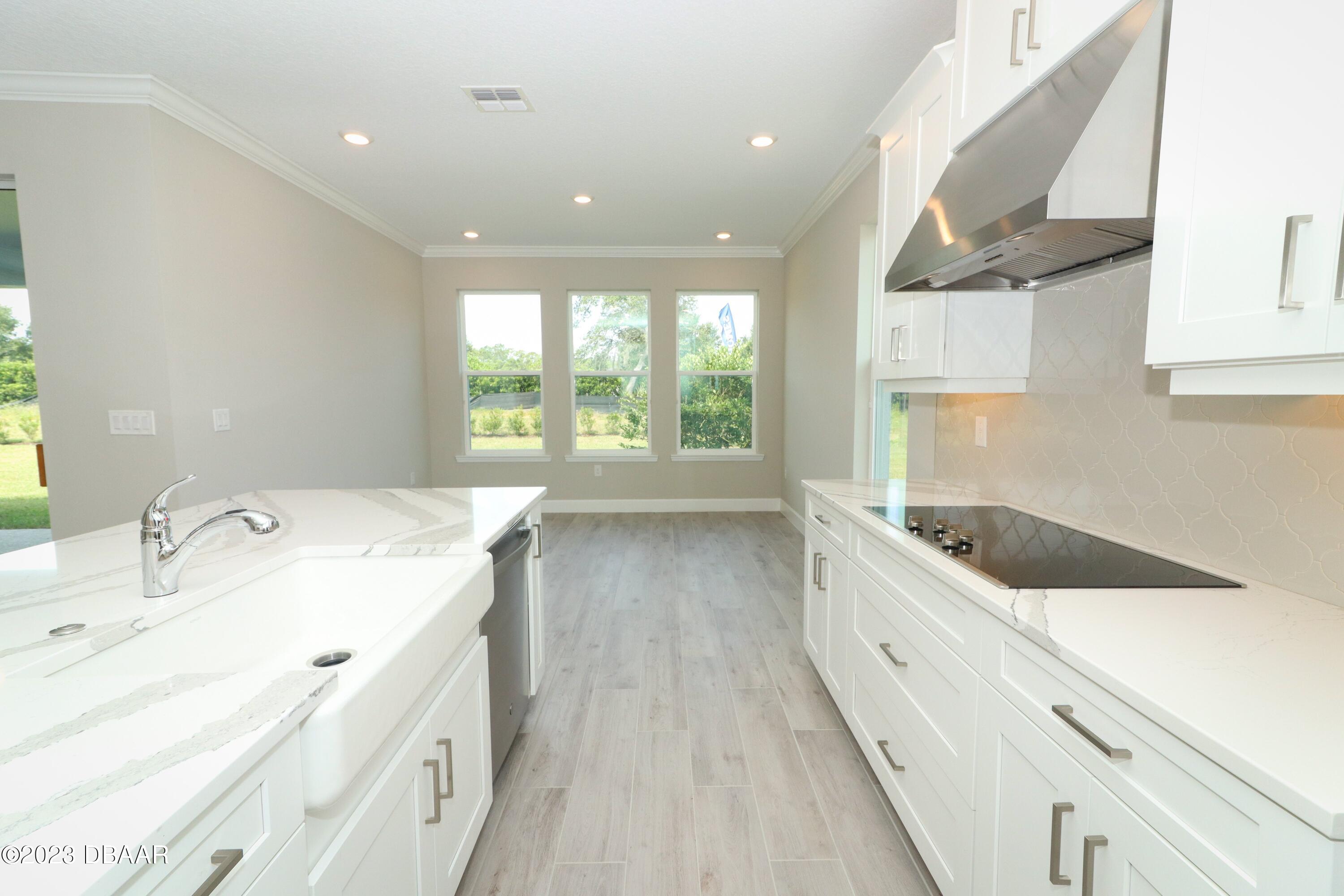 1376 Arklow Circle Ormond Beach, FL 32174 - Photo 11 of 40 41024062-012-Kitchen_Alt_View