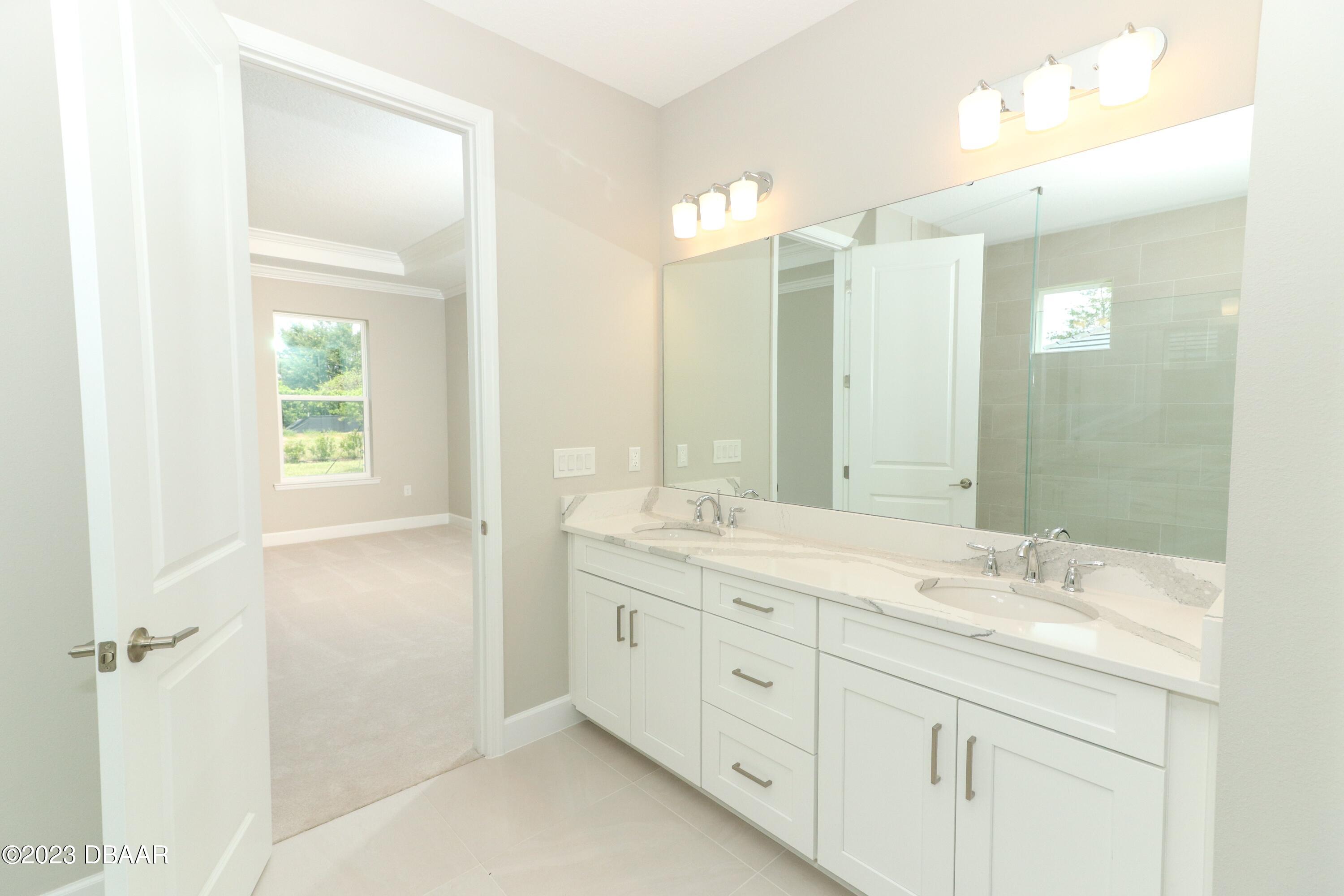 1376 Arklow Circle Ormond Beach, FL 32174 - Photo 17 of 40 41024062-021-Master_Bathroom