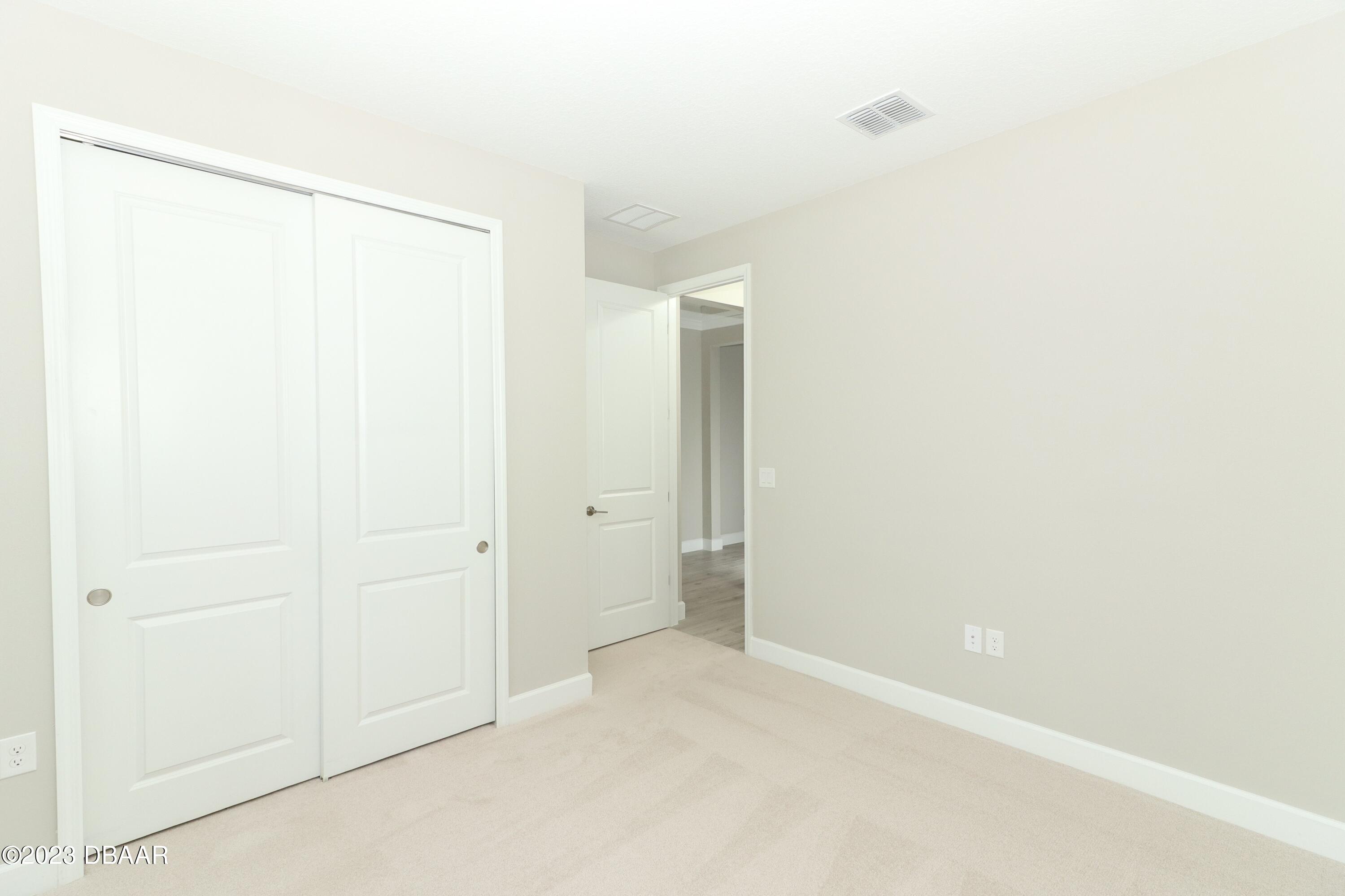 1376 Arklow Circle Ormond Beach, FL 32174 - Photo 26 of 40 41024062-032-Bedroom_Alt_View