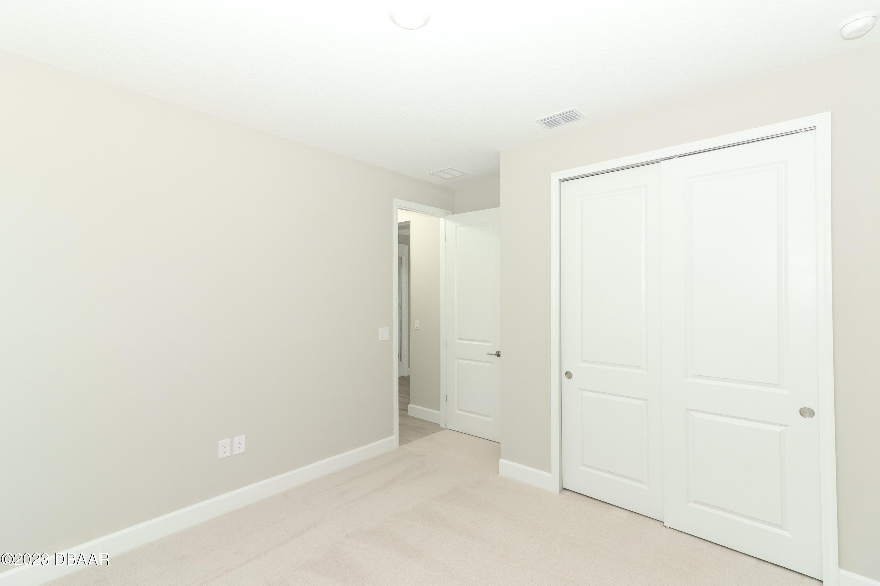 1376 Arklow Circle Ormond Beach, FL 32174 - Photo 29 of 40 41024062-035-Bedroom_Alt_View