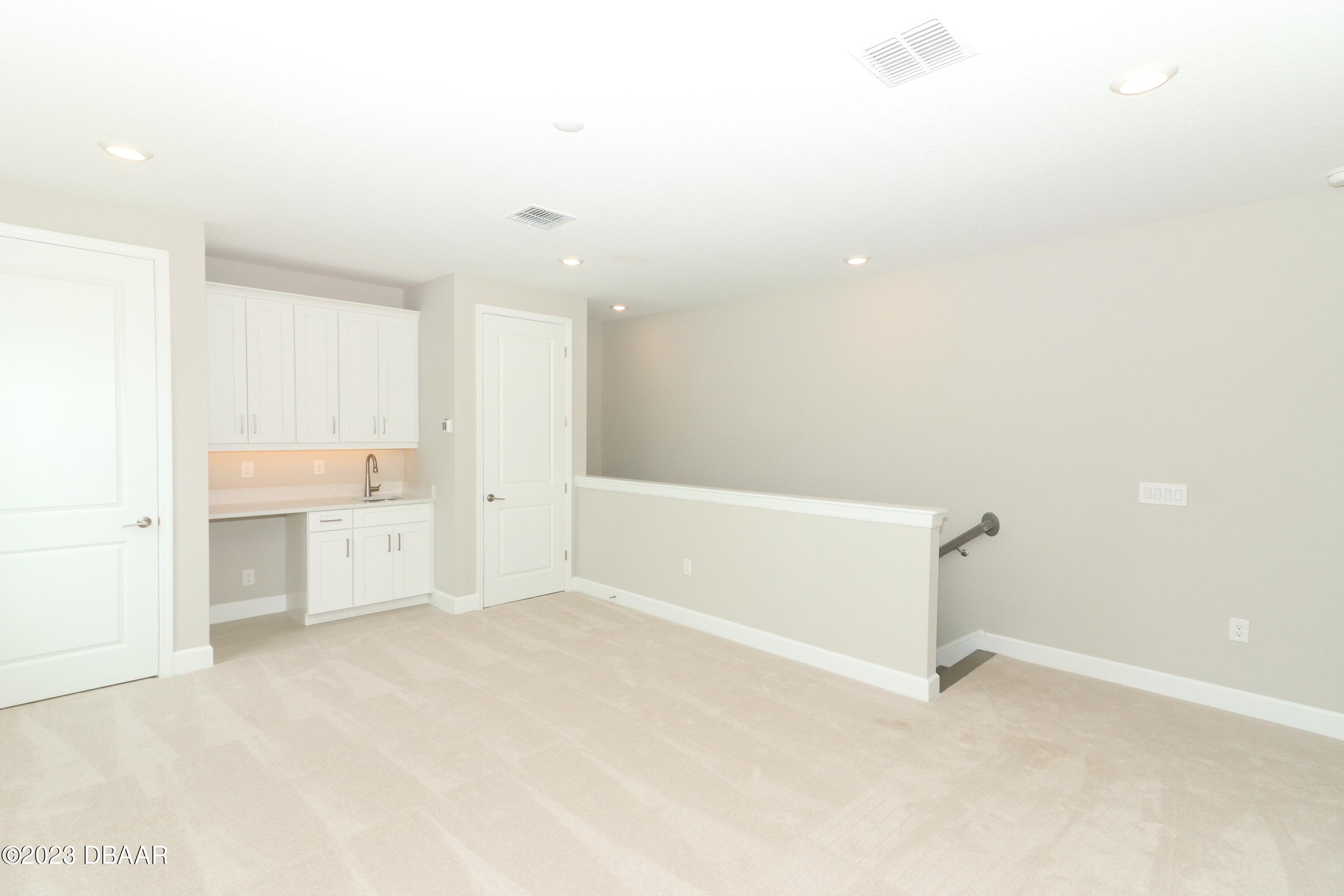 1376 Arklow Circle Ormond Beach, FL 32174 - Photo 33 of 40 41024062-040-Bonus_Room_Alt_View