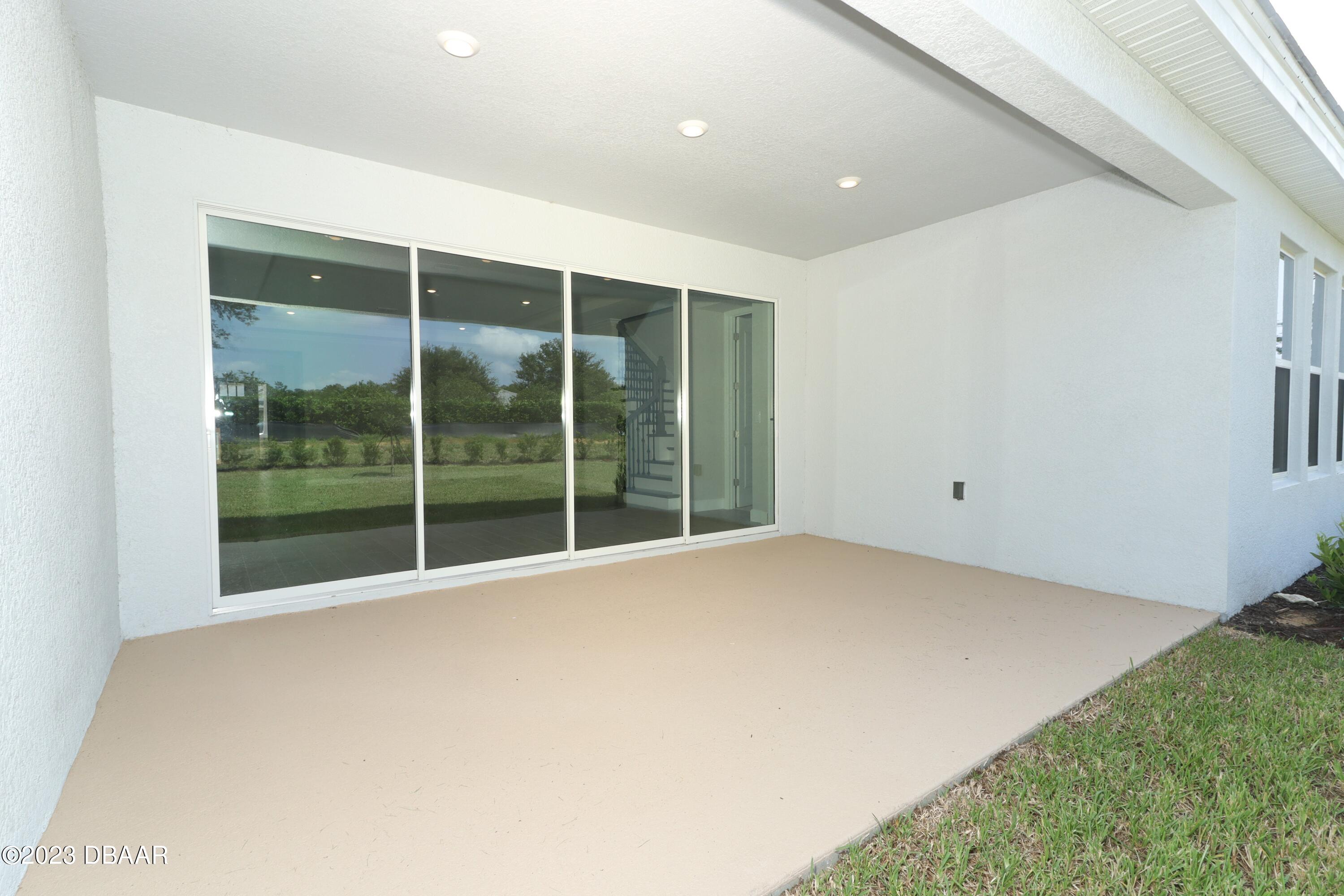 1376 Arklow Circle Ormond Beach, FL 32174 - Photo 39 of 40 41024062-047-Patio_Alt_View