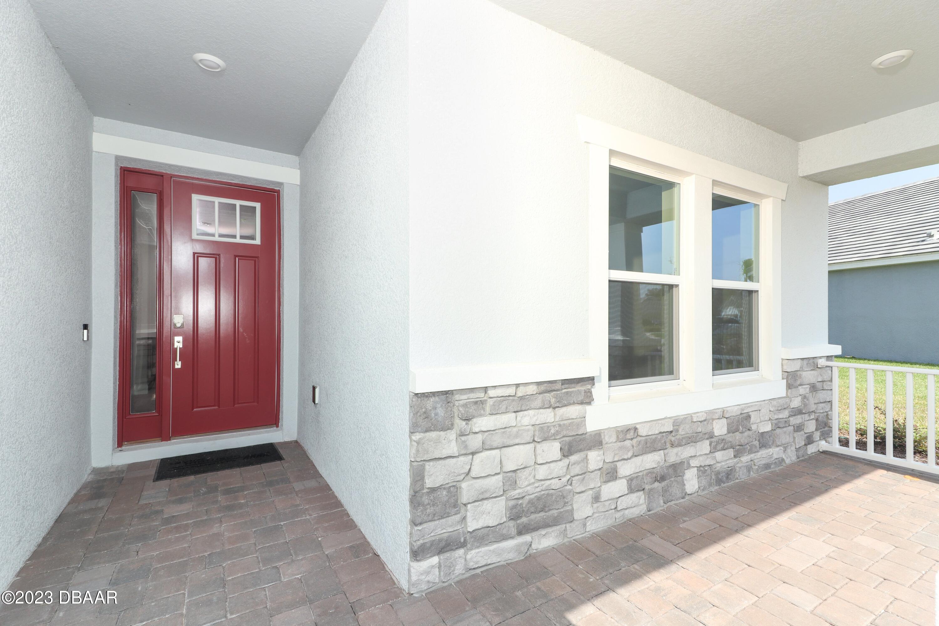 1376 Arklow Circle Ormond Beach, FL 32174 - Photo 5 of 40 41024062-002-Front_Porch