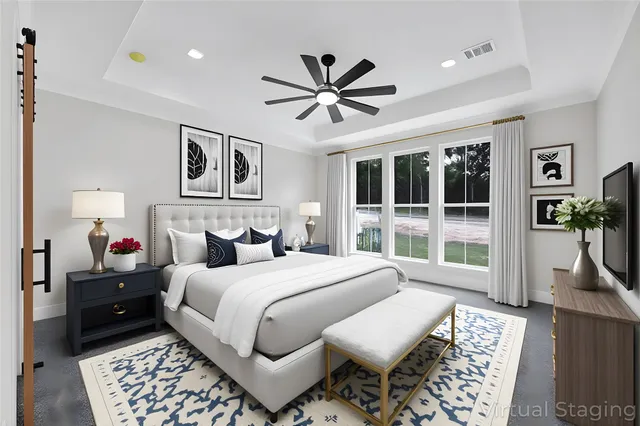 a bedroom with bed and a window