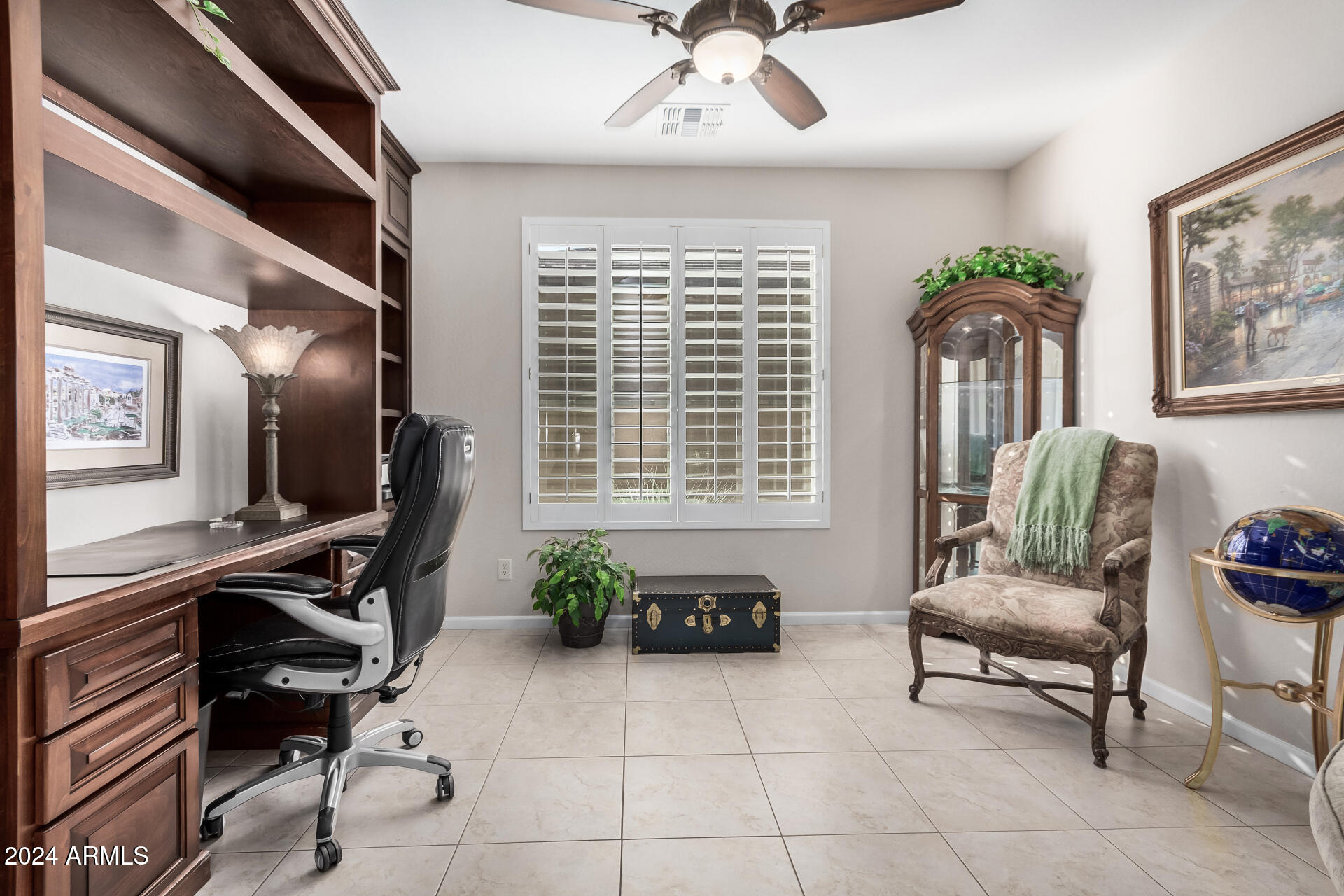 16538 West Berkeley Road Goodyear, AZ 85395 - Photo 18 of 31 a living room with furniture and a window