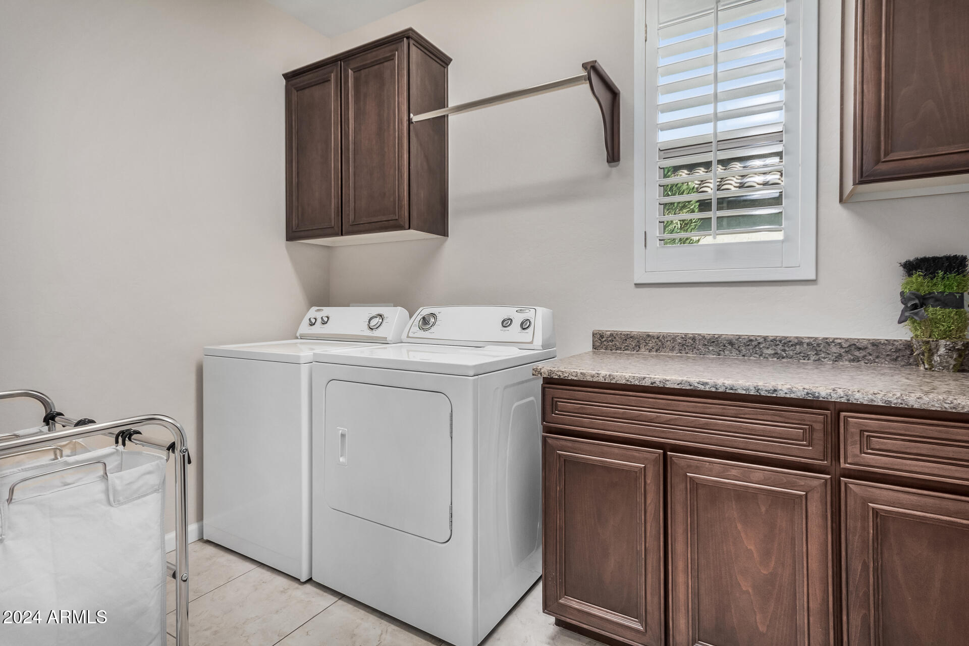16538 West Berkeley Road Goodyear, AZ 85395 - Photo 20 of 31 a utility room with dryer and washer