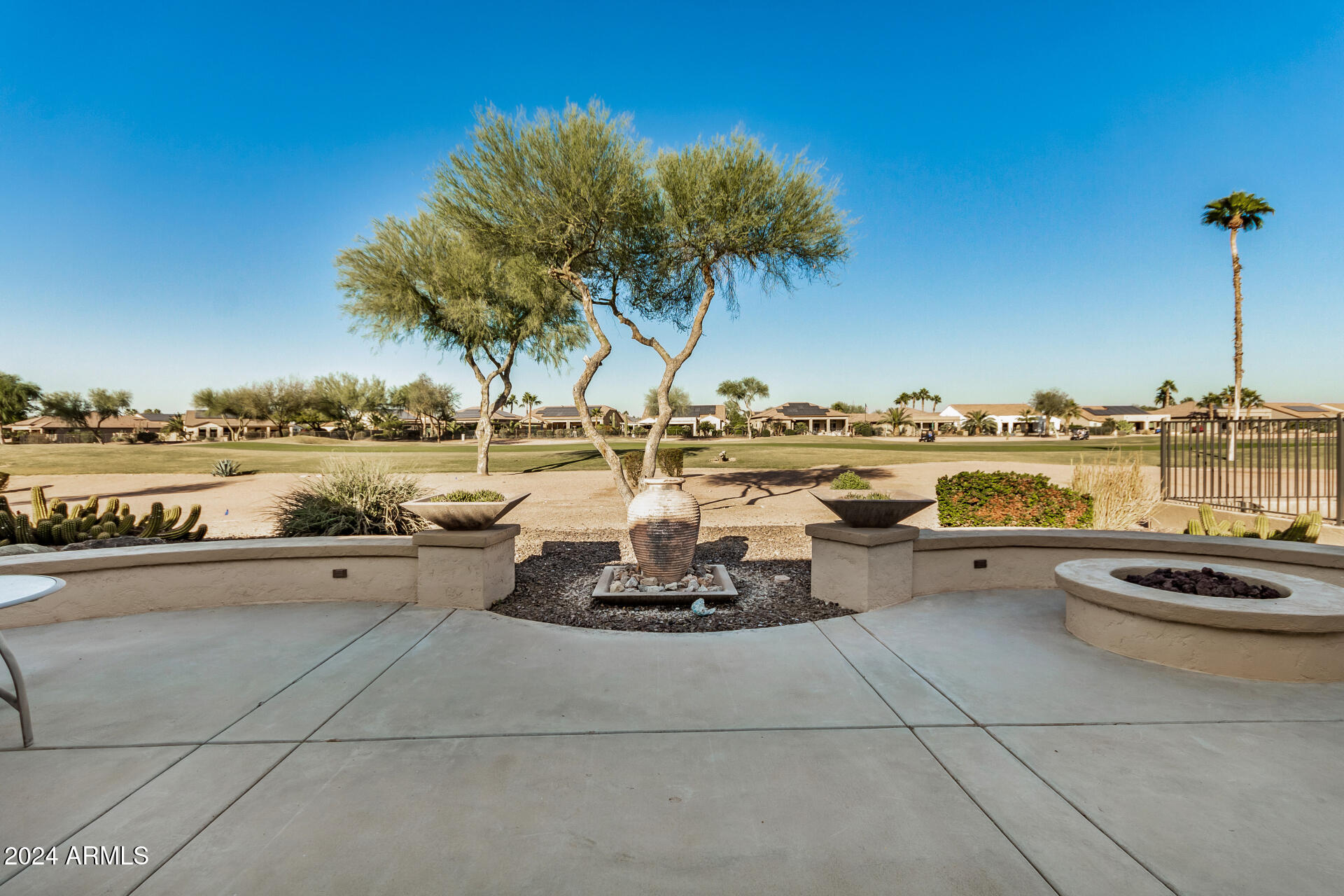 16538 West Berkeley Road Goodyear, AZ 85395 - Photo 2 of 31 a view of a lake with houses