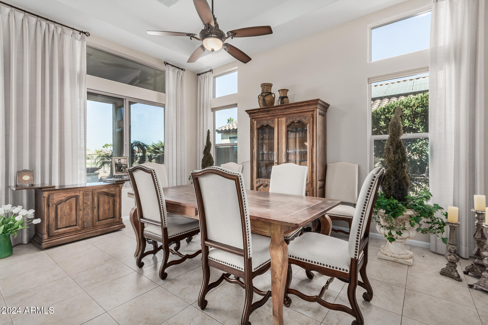 16538 West Berkeley Road Goodyear, AZ 85395 - Photo 7 of 31 a view of a dining room with furniture window and outside view