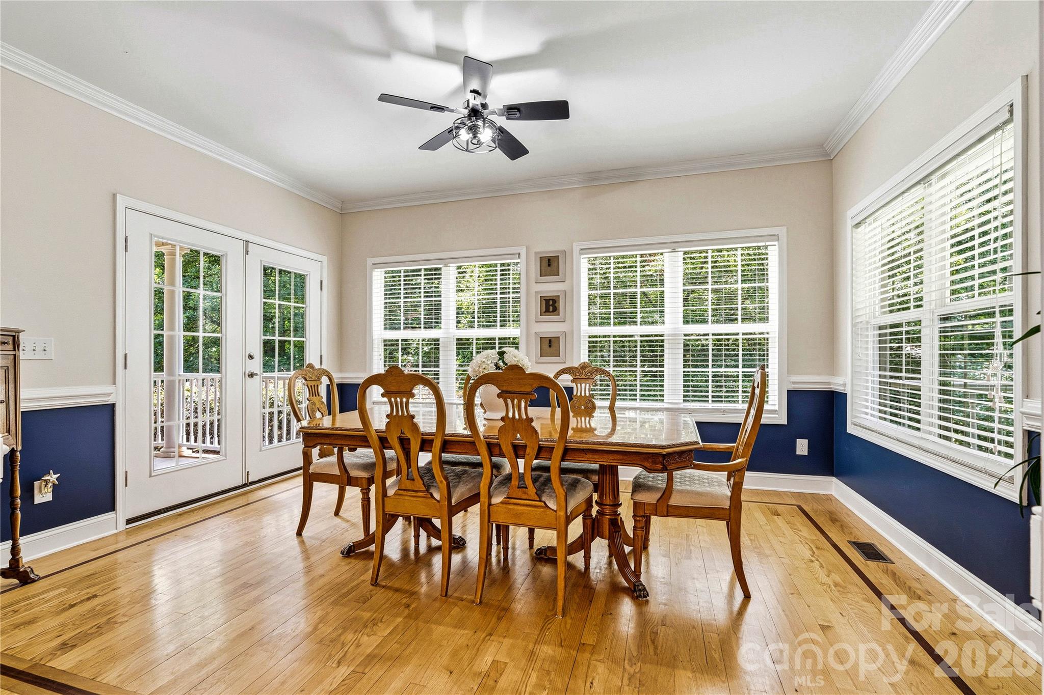 1606 High Ridge Drive Stanley, NC 28164 - Photo 13 of 44 a view of a dining room with furniture window and wooden floor