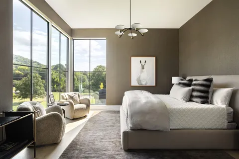 a bedroom with furniture and a bed