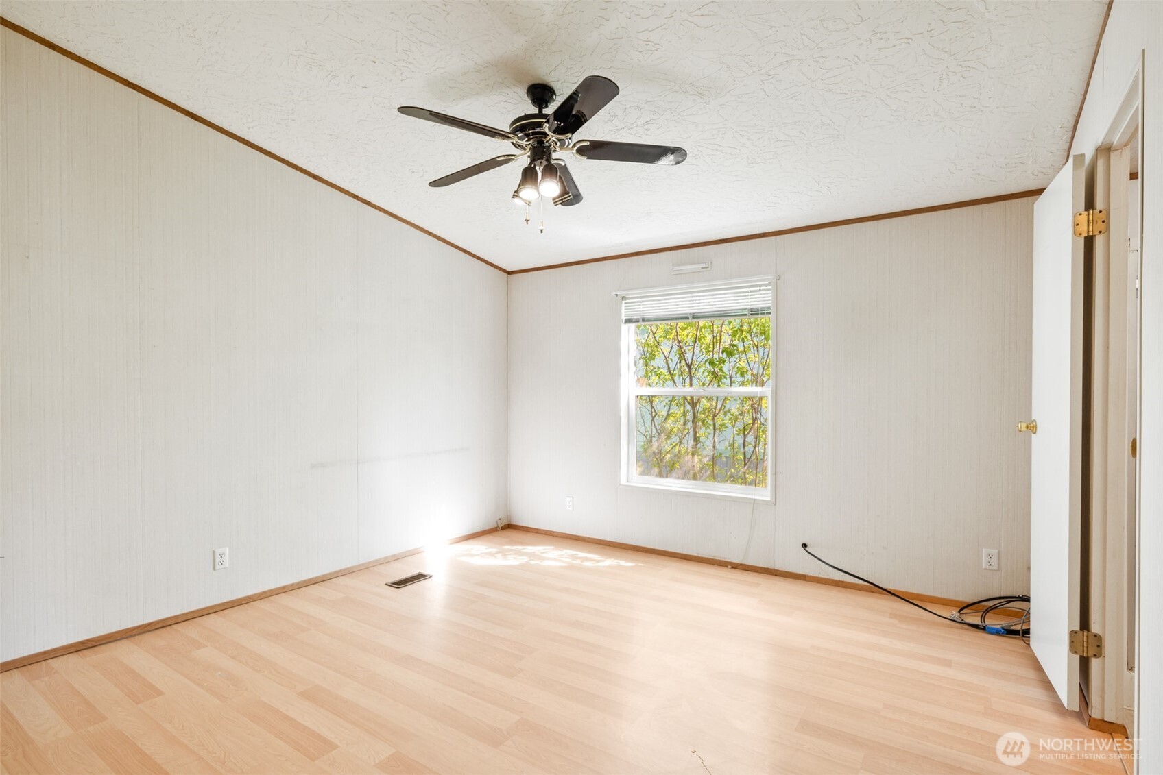 491 Mill Road, Unit 4 Sequim, WA 98382 - Photo 20 of 33 a view of a big room with windows and chandelier fan
