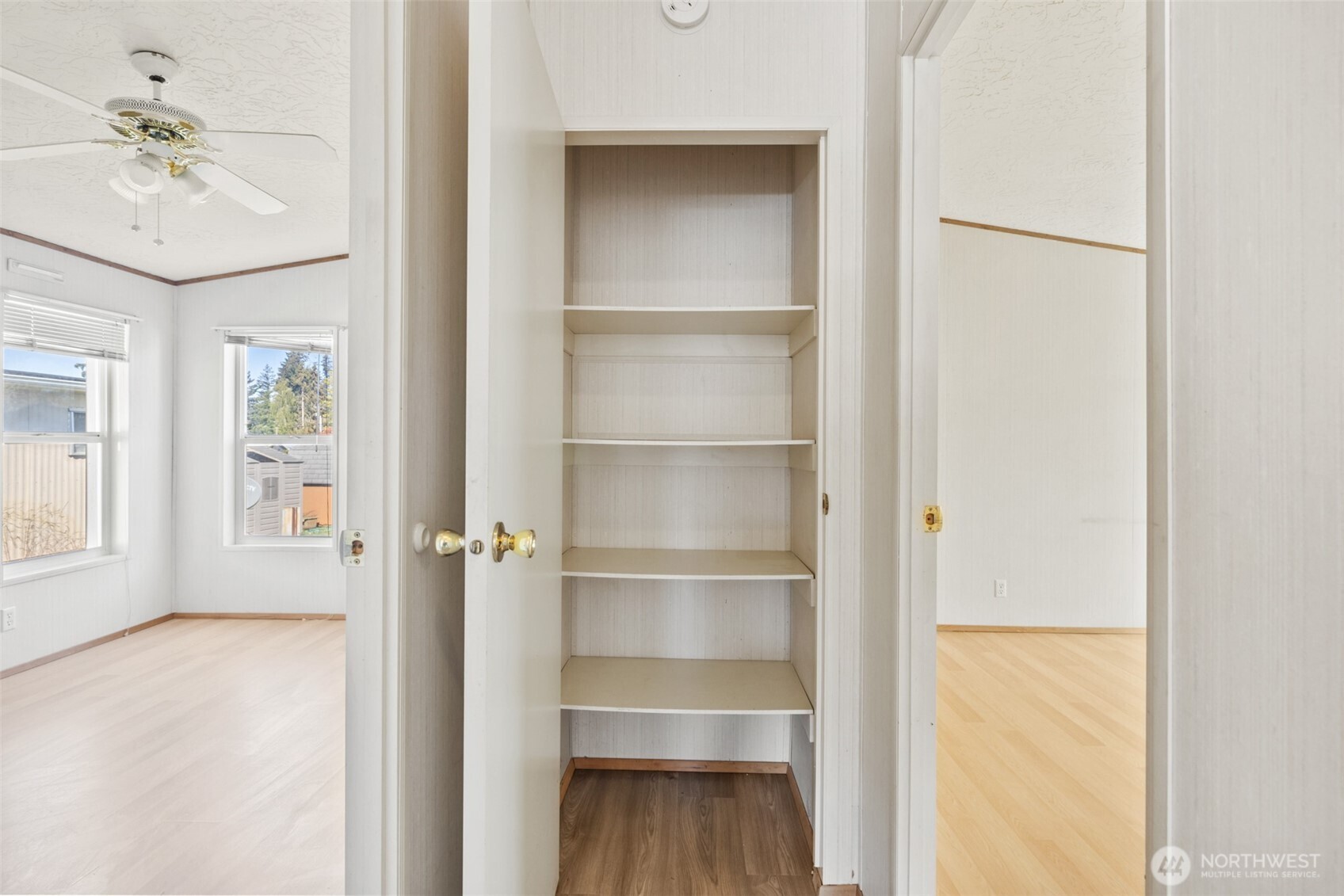 491 Mill Road, Unit 4 Sequim, WA 98382 - Photo 21 of 33 a view of walk in closet with empty racks