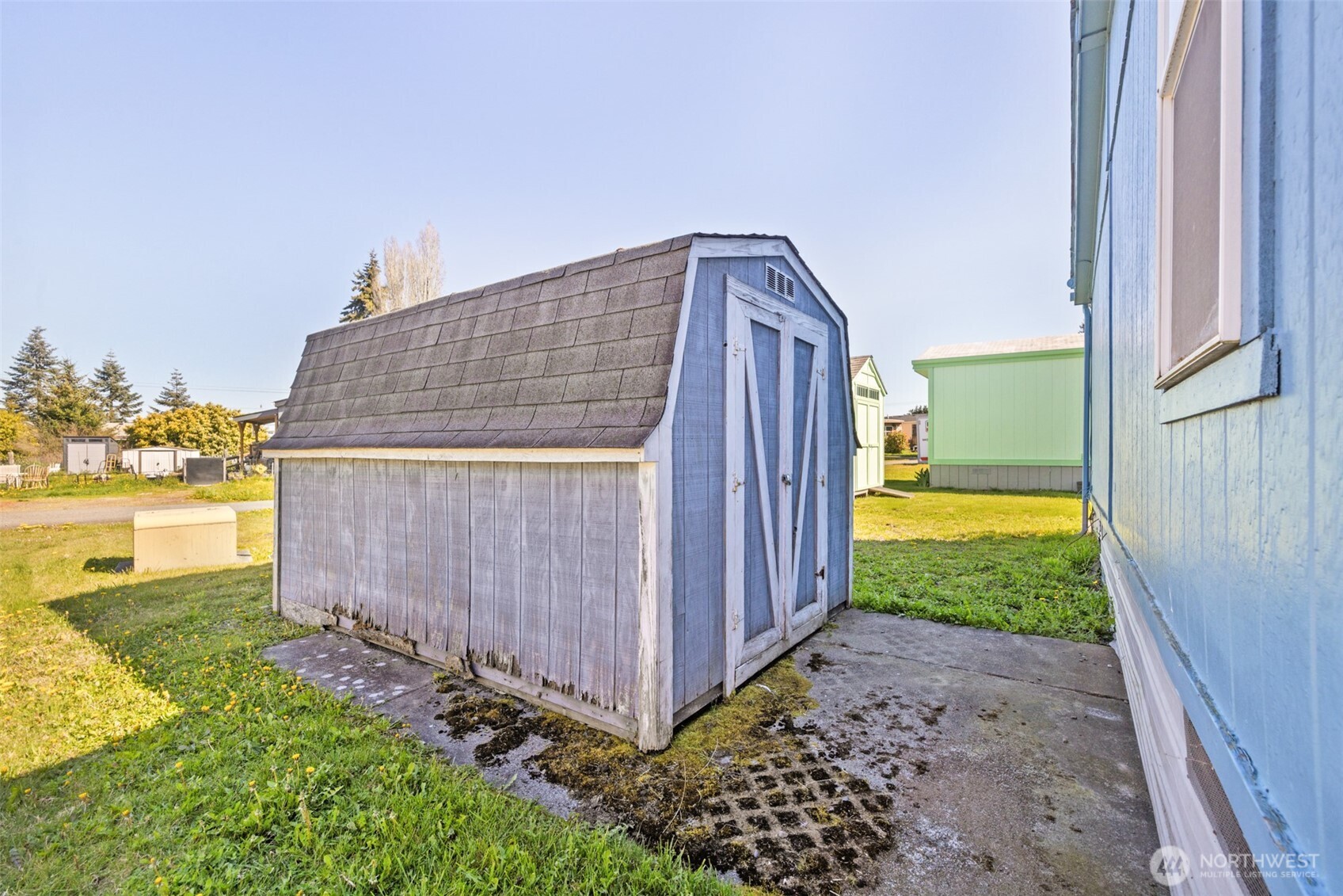 491 Mill Road, Unit 4 Sequim, WA 98382 - Photo 27 of 33 a view of a back yard of the house