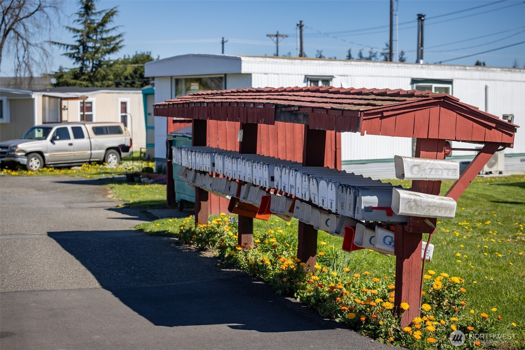 491 Mill Road, Unit 4 Sequim, WA 98382 - Photo 33 of 33 a view of a house with yard and sitting area