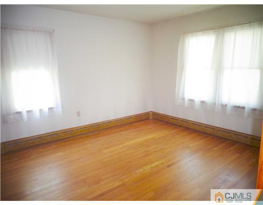 59 Orchard Road Middlesex, NJ 08846 - Photo 15 of 24 a view of an empty room and window