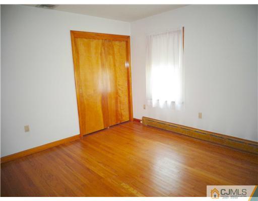 59 Orchard Road Middlesex, NJ 08846 - Photo 16 of 24 an empty room with a window