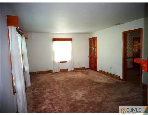 59 Orchard Road Middlesex, NJ 08846 - Photo 6 of 24 a view of empty room with window