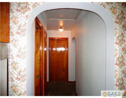 59 Orchard Road Middlesex, NJ 08846 - Photo 10 of 24 a bathroom with a shower and a mirror