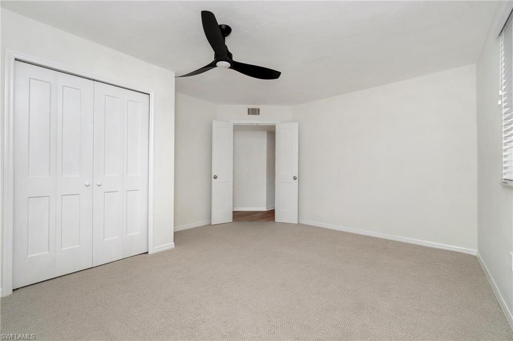 285 Naples Cove Drive, Unit 1106 Naples, FL 34110 - Photo 17 of 46 a view of an empty room