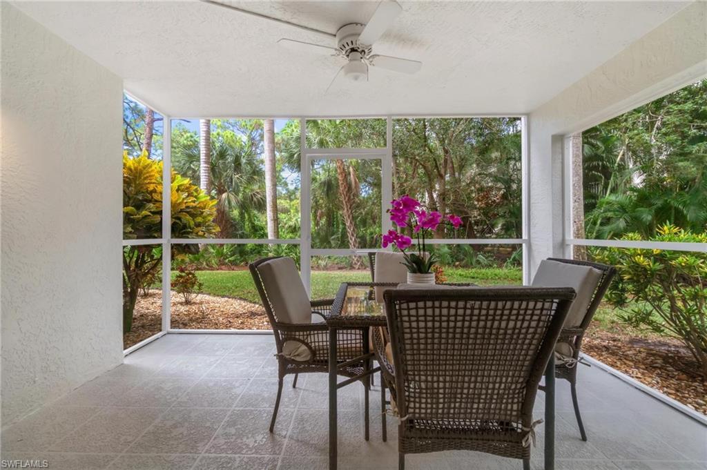 285 Naples Cove Drive, Unit 1106 Naples, FL 34110 - Photo 29 of 46 a view of a dining room with furniture window and outside view