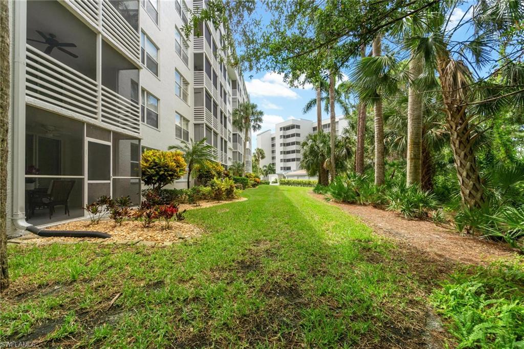285 Naples Cove Drive, Unit 1106 Naples, FL 34110 - Photo 46 of 46 a view of backyard of house with green space