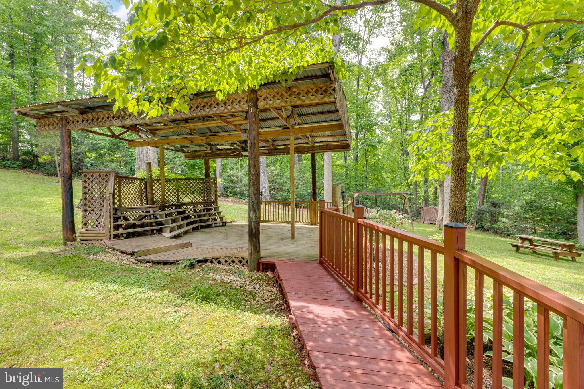 12320 Running Deer Road Manassas, VA 20112 - Photo 33 of 39 Decking view from side of home
