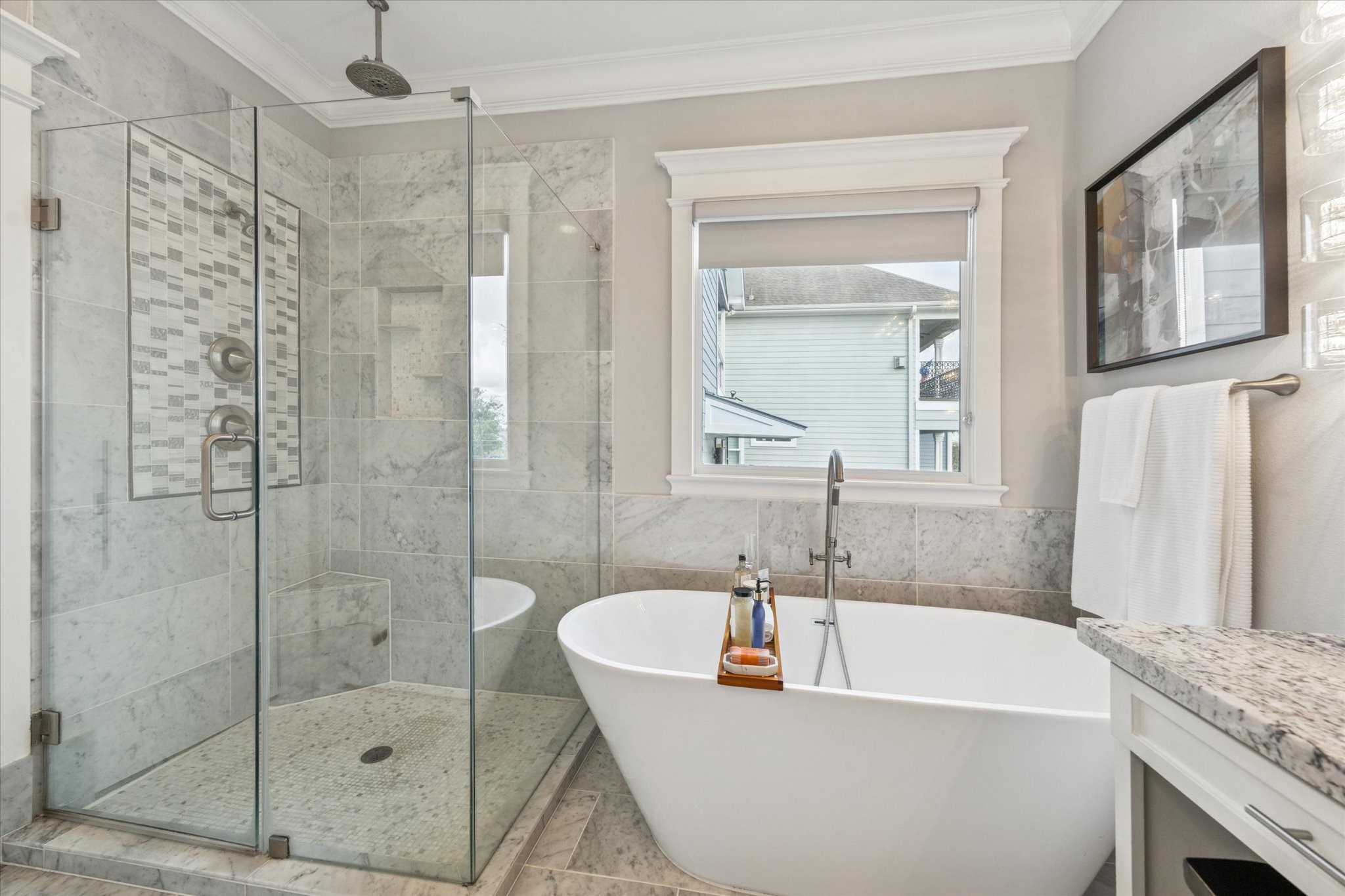 209 West 24th Street Houston, TX 77008 - Photo 21 of 36 Relax and unwind in the spacious shower featuring a rainfall shower head, or soak in the luxurious tub.