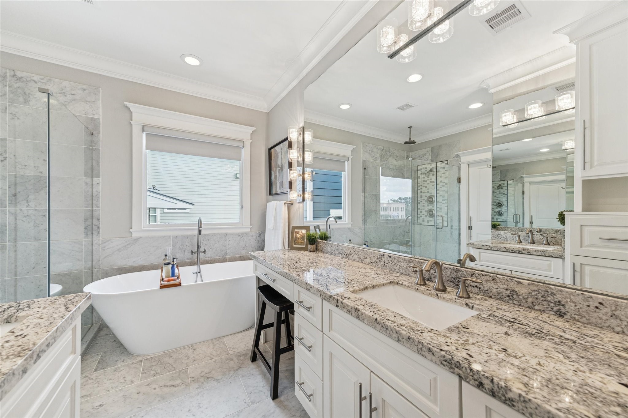 209 West 24th Street Houston, TX 77008 - Photo 22 of 36 Ample counter space makes getting ready for the day effortless in this bathroom.
