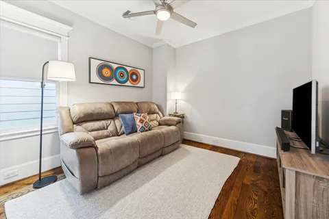 a bathroom with a granite countertop sink a mirror and a shower