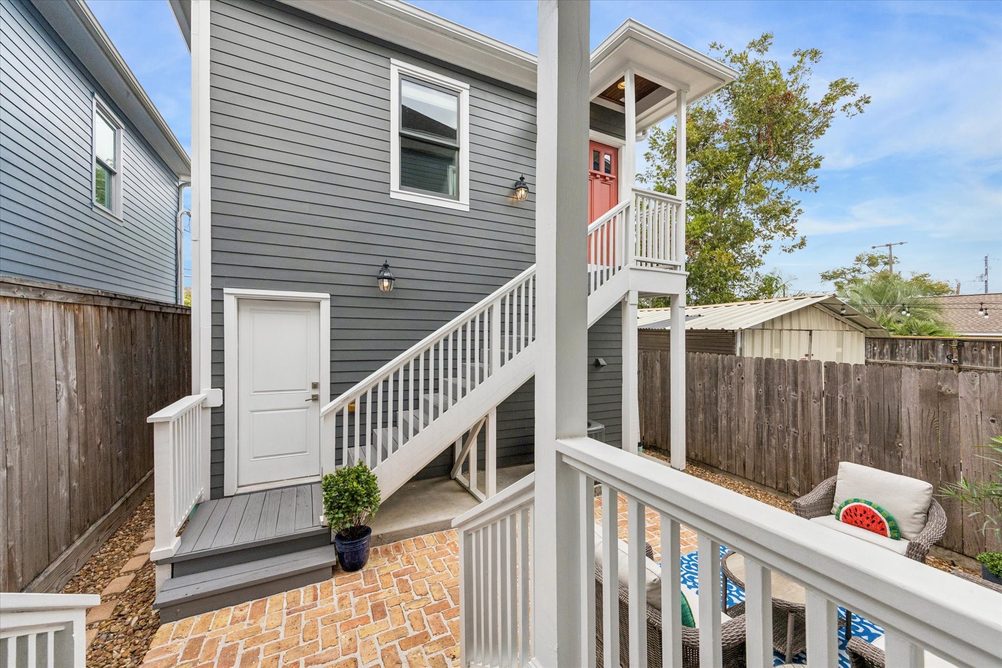 209 West 24th Street Houston, TX 77008 - Photo 28 of 36 A wide alley leads to the two-car garage with built-ins and a washer and dryer hook up that is perfect if you have a tenant in the garage apartment.